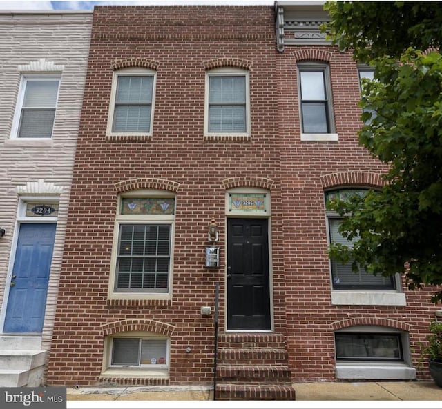 3206 Fait Ave, Baltimore, MD 21224 - townhome / multi-family property featuring entry steps and brick siding