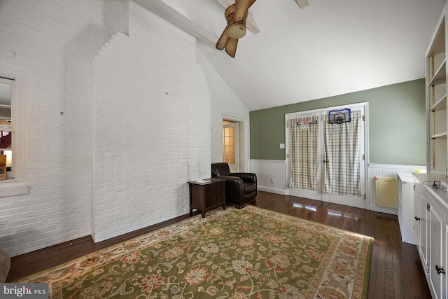 201 S Rd, Wilmington, DE 19809 - office area with dark wood finished floors, ceiling fan, wainscoting, high vaulted ceiling, and brick wall