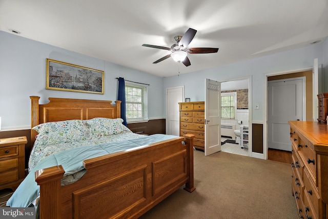 201 S Rd, Wilmington, DE 19809 - carpeted bedroom with radiator, ceiling fan, and ensuite bath