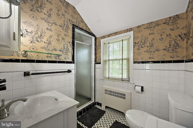 201 S Rd, Wilmington, DE 19809 - full bath featuring radiator, wallpapered walls, tile walls, toilet, and a stall shower