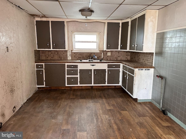 5247 Lincoln Hwy W, Thomasville, PA 17364 - kitchen featuring dark countertops, dark wood finished floors, a drop ceiling, a sink, and tasteful backsplash