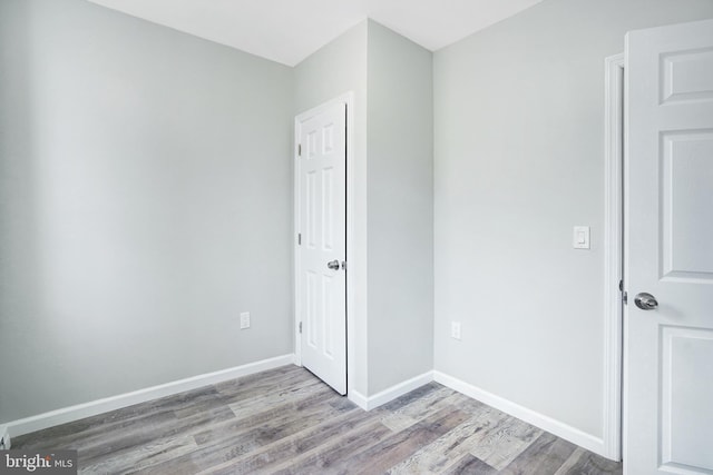 565 Line St, Camden, NJ 08103 - unfurnished bedroom with wood finished floors and baseboards