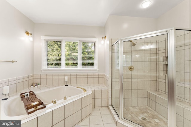 22962 Lois Ln, Brambleton, VA 20148 - full bathroom featuring a garden tub, a stall shower, and tile patterned floors