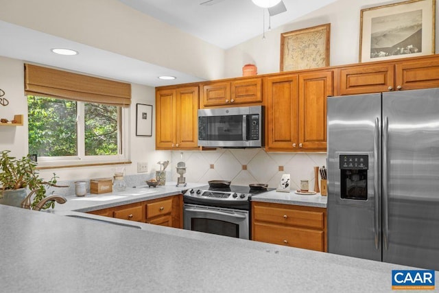 213 Turkey Ridge Rd, Charlottesville, VA 22903 - kitchen featuring stainless steel appliances, light countertops, a sink, decorative backsplash, and recessed lighting