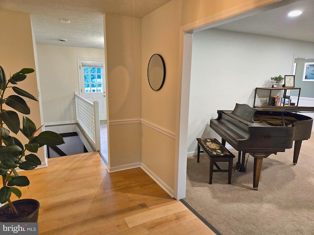 1222 Pinehurst Rd, Staunton, VA 24401 - hall with an upstairs landing, wood finished floors, baseboards, and recessed lighting