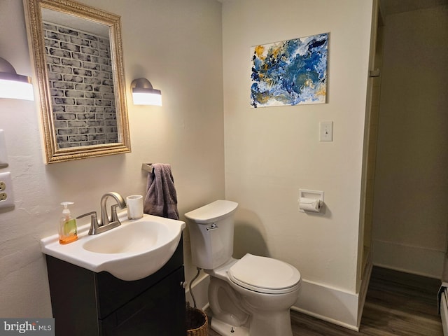 1222 Pinehurst Rd, Staunton, VA 24401 - full bathroom featuring wood finished floors, vanity, toilet, and baseboards