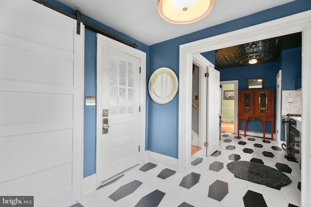 1107 Kenmore Ave, Fredericksburg, VA 22401 - foyer with tile patterned floors and baseboards