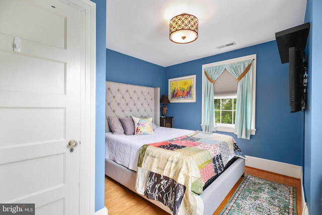 1107 Kenmore Ave, Fredericksburg, VA 22401 - bedroom with baseboards and wood finished floors