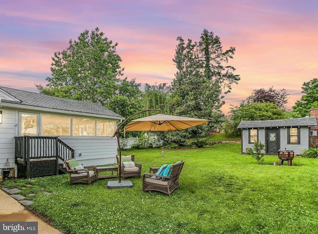 1107 Kenmore Ave, Fredericksburg, VA 22401 - yard at dusk featuring outdoor lounge area, a yard, and an outbuilding