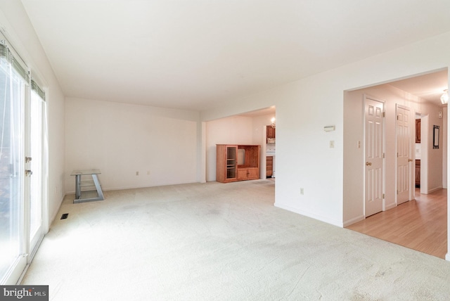 1813 Creek View Ct, New Cumberland, PA 17070 - unfurnished living room with light carpet and baseboards
