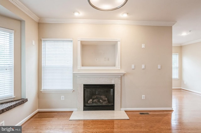3416 Barnhouse Dr, Edgewater, MD 21037 - unfurnished living room with crown molding, wood finished floors, a high end fireplace, and baseboards