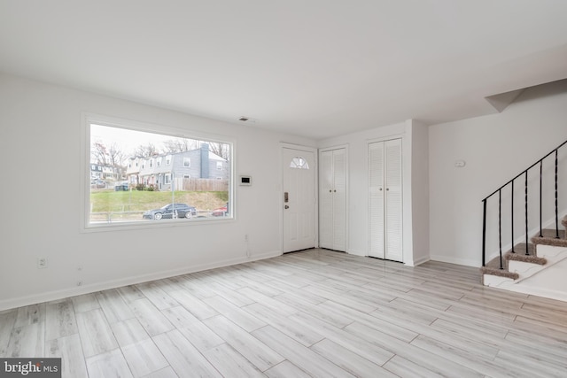 1722 Allendale Pl, Landover, MD 20785 - entrance foyer with stairs, baseboards, and wood finished floors