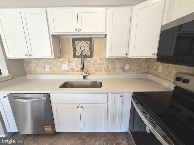 1248 Steed St, Ranson, WV 25438 - kitchen with stainless steel appliances, a sink, white cabinets, and light countertops