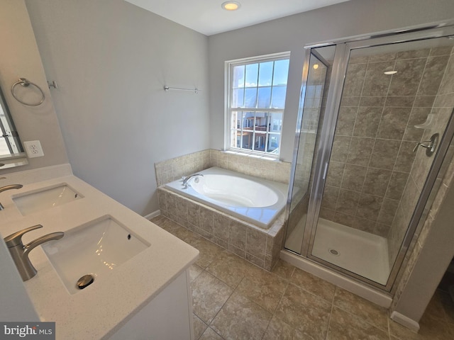 1248 Steed St, Ranson, WV 25438 - bathroom featuring double vanity, a garden tub, and a shower stall