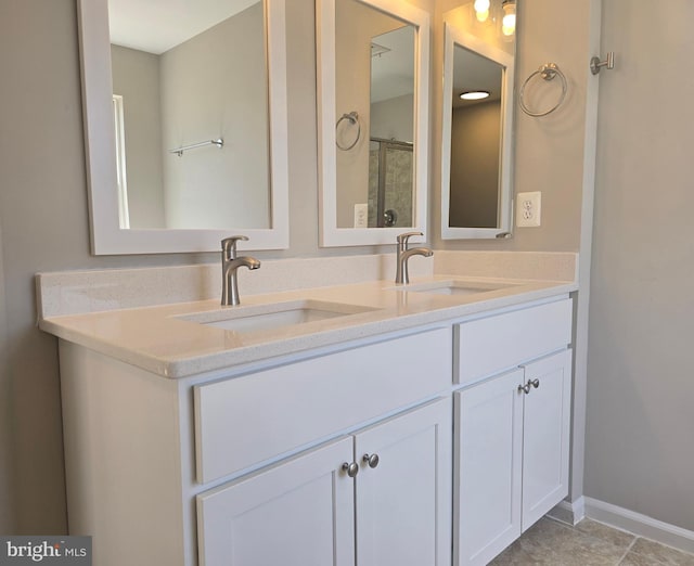 1248 Steed St, Ranson, WV 25438 - bathroom featuring double vanity and baseboards
