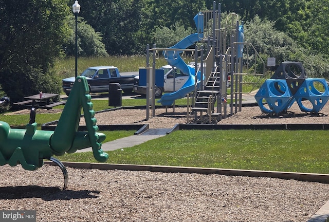 1248 Steed St, Ranson, WV 25438 - community jungle gym featuring a forest view
