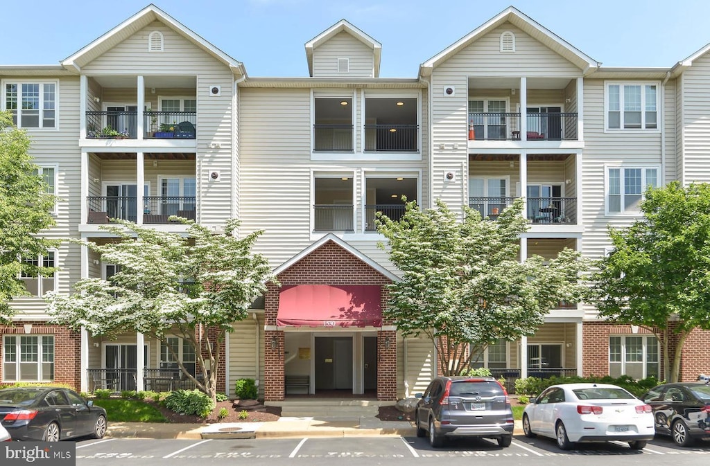 1530 Spring Gate Dr Unit 9317, Mclean, VA 22102 - view of property with uncovered parking