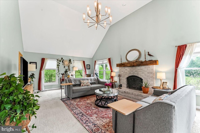 11 White Oak Dr, West Grove, PA 19390 - living room featuring high vaulted ceiling, carpet floors, a chandelier, a fireplace, and baseboards