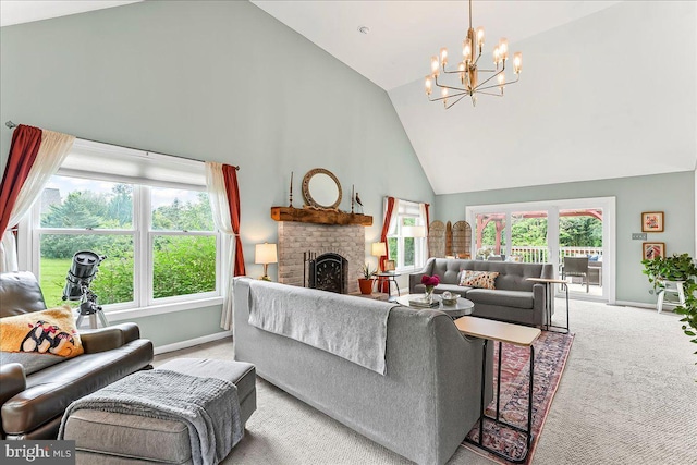 11 White Oak Dr, West Grove, PA 19390 - living room with high vaulted ceiling, carpet flooring, a chandelier, baseboards, and a brick fireplace