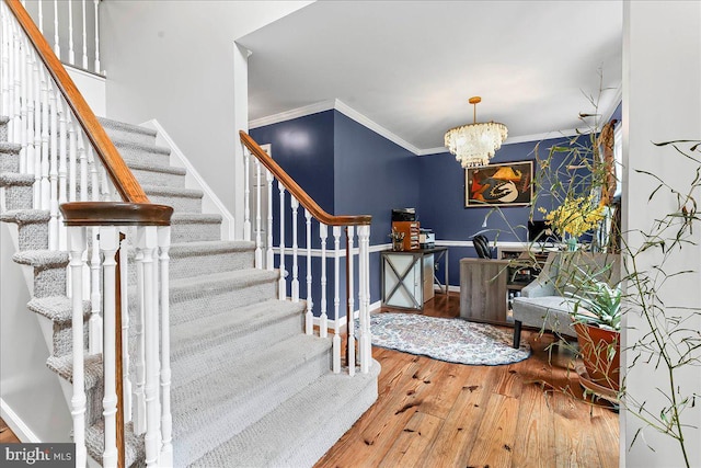 11 White Oak Dr, West Grove, PA 19390 - entryway featuring stairs, wood-type flooring, ornamental molding, a chandelier, and baseboards