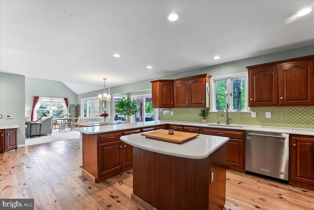 11 White Oak Dr, West Grove, PA 19390 - kitchen featuring stainless steel dishwasher, a sink, light countertops, a peninsula, and recessed lighting