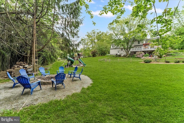 11 White Oak Dr, West Grove, PA 19390 - view of green lawn with an outdoor fire pit and a playground