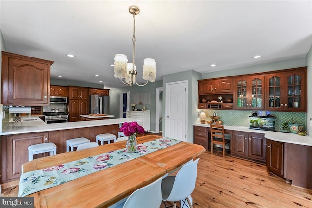 11 White Oak Dr, West Grove, PA 19390 - dining space with recessed lighting, a chandelier, and light wood-style floors