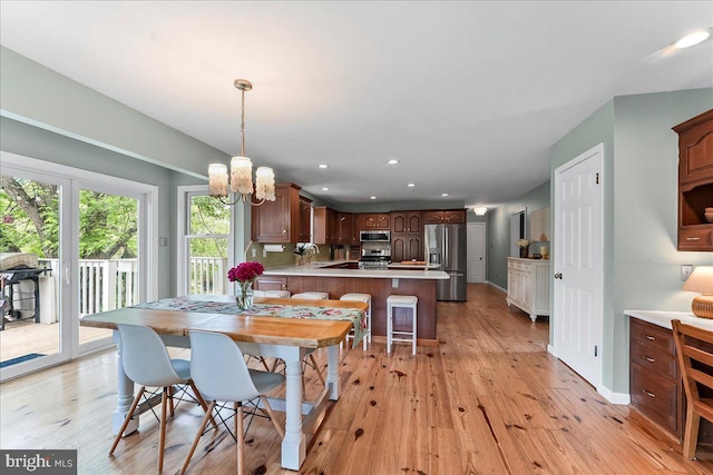11 White Oak Dr, West Grove, PA 19390 - dining room featuring light wood finished floors, a chandelier, recessed lighting, and baseboards