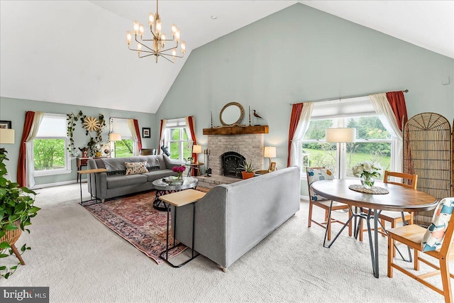 11 White Oak Dr, West Grove, PA 19390 - living room with high vaulted ceiling, carpet floors, a brick fireplace, and a chandelier