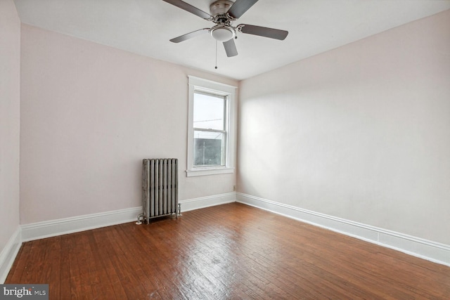 6745 Woodley, Dundalk, MD 21222 - unfurnished room featuring radiator, wood-type flooring, baseboards, and ceiling fan