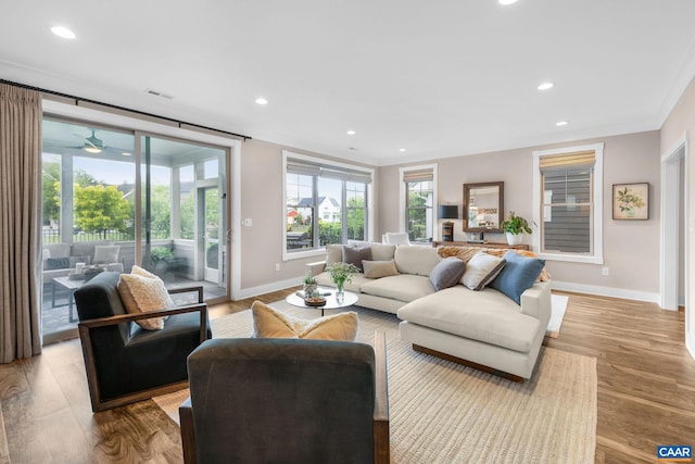 729 Highgate Row, Crozet, VA 22932 - living area featuring baseboards, crown molding, wood finished floors, recessed lighting, and ceiling fan