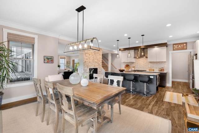 729 Highgate Row, Crozet, VA 22932 - dining space with wood finished floors, recessed lighting, crown molding, and baseboards