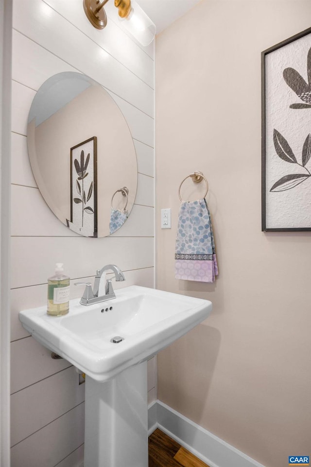 729 Highgate Row, Crozet, VA 22932 - bathroom with wood finished floors, a sink, and baseboards