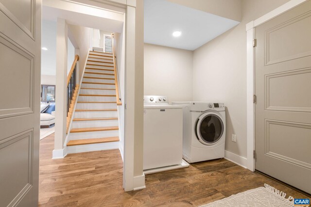 729 Highgate Row, Crozet, VA 22932 - laundry area with independent washer and dryer, light wood-type flooring, baseboards, and recessed lighting