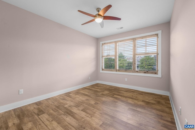 729 Highgate Row, Crozet, VA 22932 - unfurnished room featuring a ceiling fan, wood finished floors, lofted ceiling, and baseboards