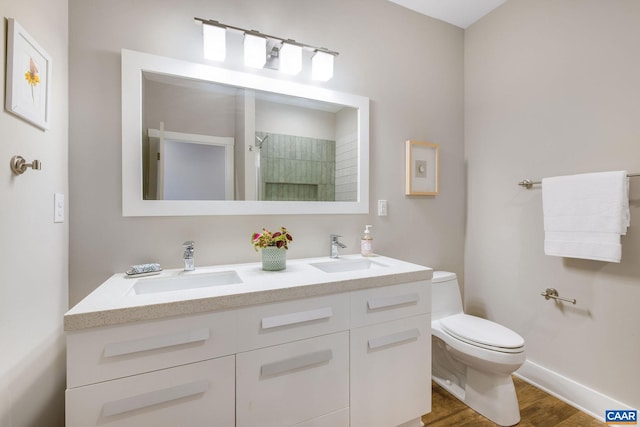 729 Highgate Row, Crozet, VA 22932 - full bath with double vanity, toilet, wood finished floors, a shower, and baseboards