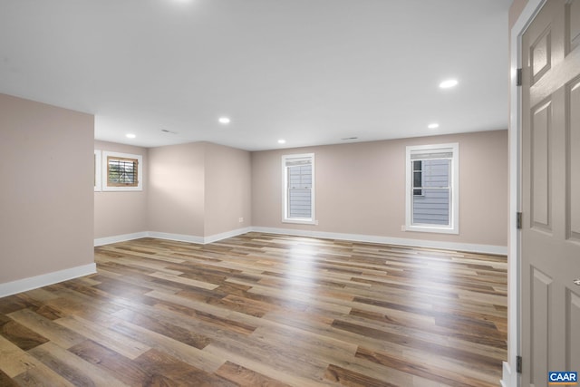 729 Highgate Row, Crozet, VA 22932 - unfurnished room with baseboards, wood finished floors, and recessed lighting