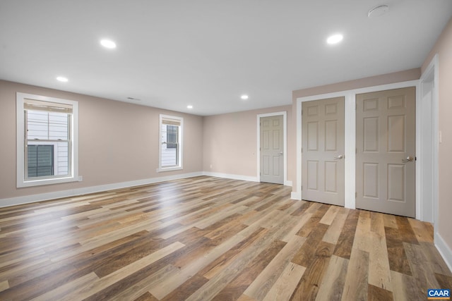 729 Highgate Row, Crozet, VA 22932 - unfurnished bedroom with light wood-type flooring, baseboards, and recessed lighting