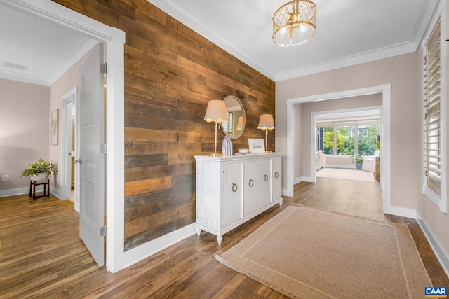 729 Highgate Row, Crozet, VA 22932 - corridor featuring ornamental molding, a chandelier, wood finished floors, and baseboards