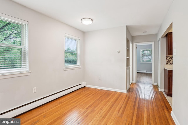 1100 Tyson Ave Unit A-10, Abington, PA 19001 - spare room featuring a baseboard radiator, plenty of natural light, and baseboard heating