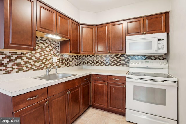 1100 Tyson Ave Unit A-10, Abington, PA 19001 - kitchen featuring white appliances, a sink, light countertops, and backsplash