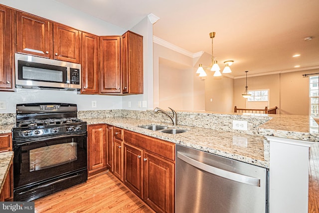 11919 Little Seneca Pkwy, Clarksburg, MD 20871 - kitchen with stainless steel appliances, a sink, ornamental molding, light wood-type flooring, and a chandelier