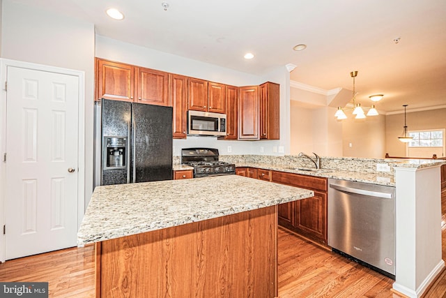 11919 Little Seneca Pkwy, Clarksburg, MD 20871 - kitchen featuring black appliances, a sink, a peninsula, light wood-style floors, and light stone countertops