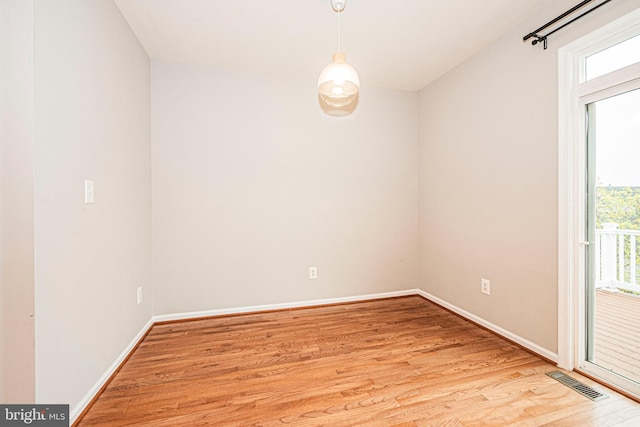 11919 Little Seneca Pkwy, Clarksburg, MD 20871 - empty room featuring light wood-type flooring, healthy amount of natural light, and baseboards