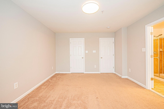 11919 Little Seneca Pkwy, Clarksburg, MD 20871 - unfurnished bedroom featuring light colored carpet, baseboards, and ensuite bathroom