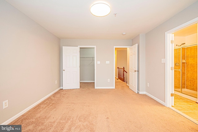 11919 Little Seneca Pkwy, Clarksburg, MD 20871 - unfurnished bedroom with carpet flooring, a walk in closet, baseboards, and ensuite bathroom
