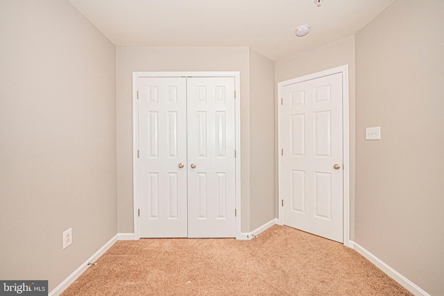 11919 Little Seneca Pkwy, Clarksburg, MD 20871 - unfurnished bedroom with light colored carpet, a closet, and baseboards