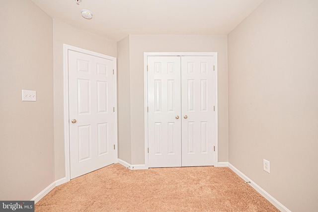 11919 Little Seneca Pkwy, Clarksburg, MD 20871 - unfurnished bedroom with light colored carpet, baseboards, and a closet