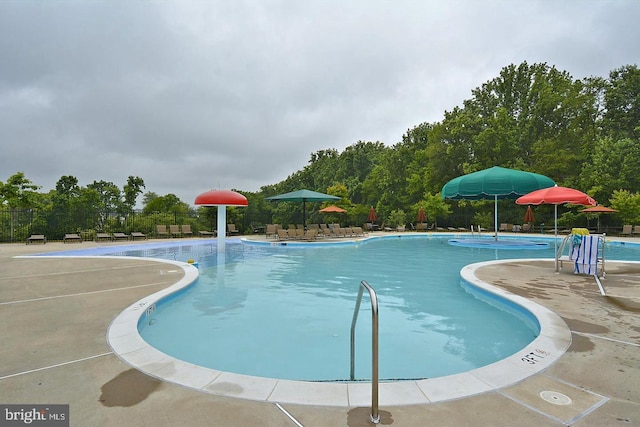 11919 Little Seneca Pkwy, Clarksburg, MD 20871 - community pool featuring a patio