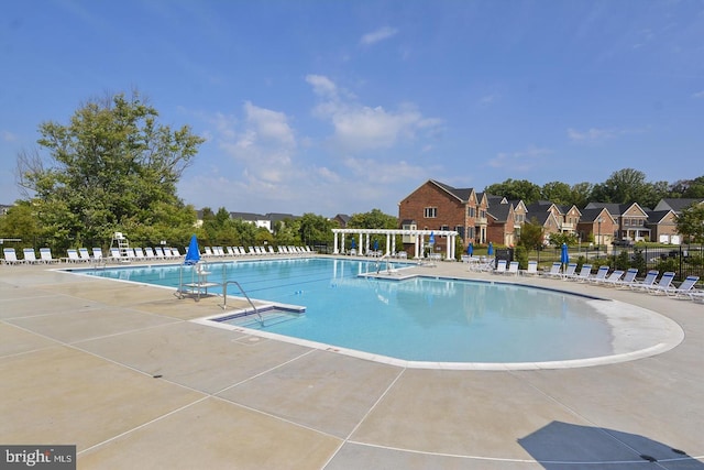 11919 Little Seneca Pkwy, Clarksburg, MD 20871 - community pool featuring a pergola, a patio area, and a residential view